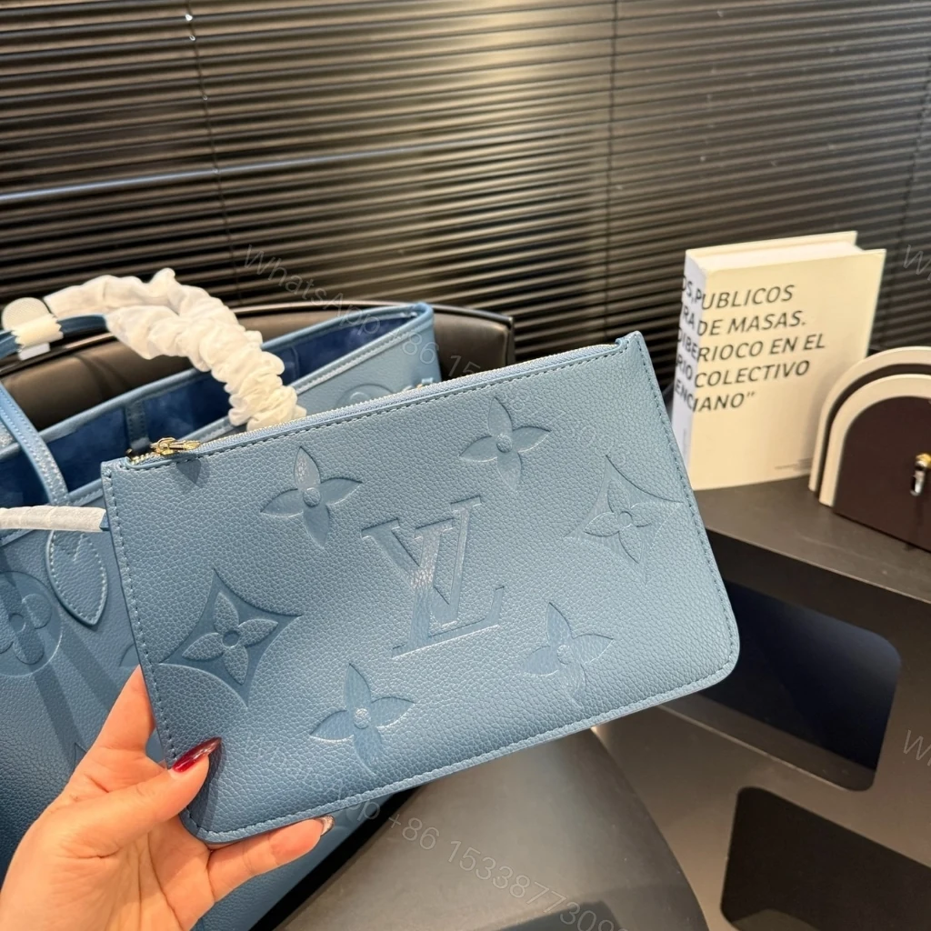 View 7 of Louis Vuitton Neverfull MM Tote Bag Monogram Empreinte Bleu Jean 31cm M27358