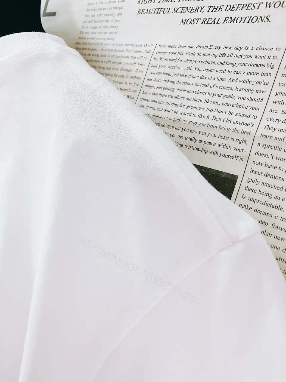 View 5 of White Cotton Tee + Subtle Logo Embellishment + Luxe Casual + Elevated Detail + T-Shirt