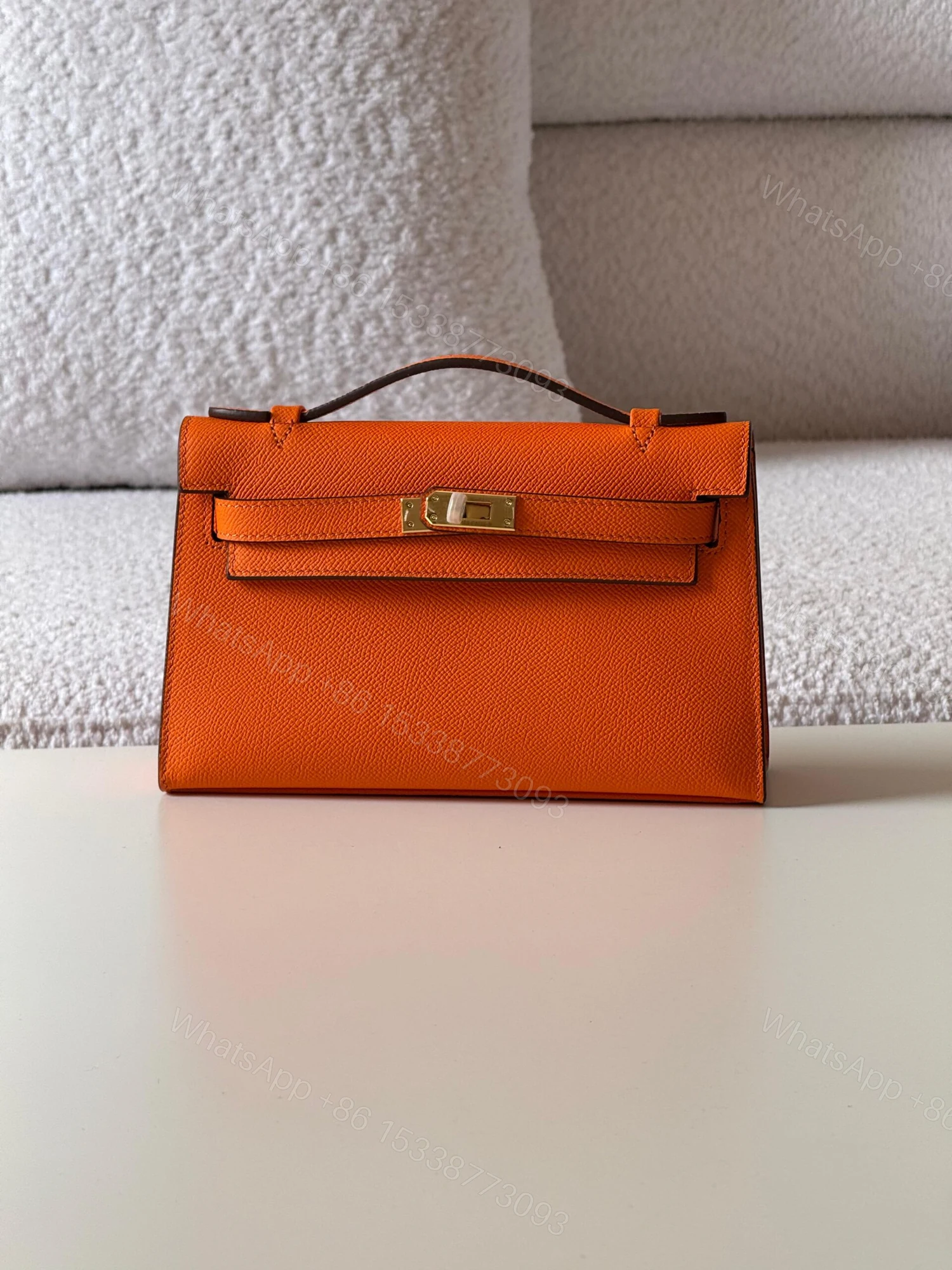 Hermes Kelly Orange Pochette Bag — view 1