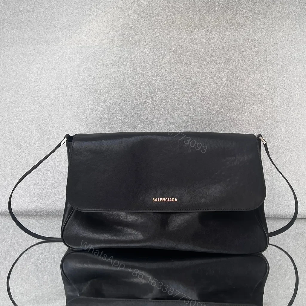 Compact Black Leather Crossbody: Subtle Luxe, Minimal Hardware — view 1