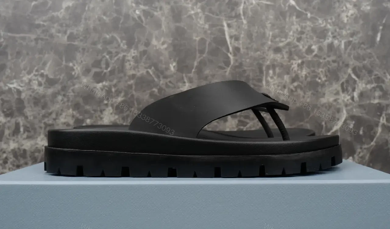 View 2 of Black Leather Flip-Flops Modern Minimalist Prada Slip-On Style Beach Footwear
