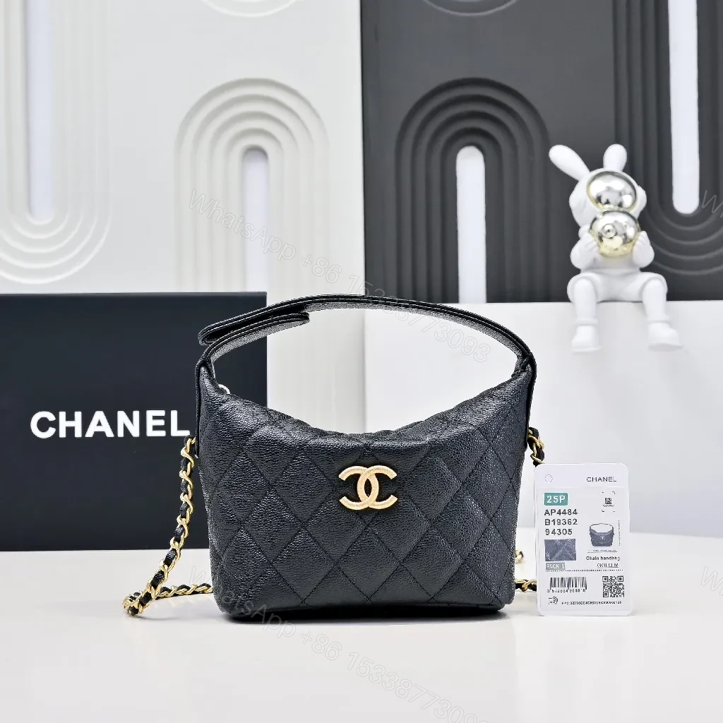 Compact Black Quilted Mini Bag with Gold Hardware, Crossbody Style — view 1