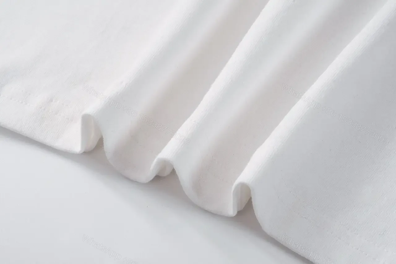 View 5 of White Cotton Minimalist Graphic Tee with Pearlescent Accent