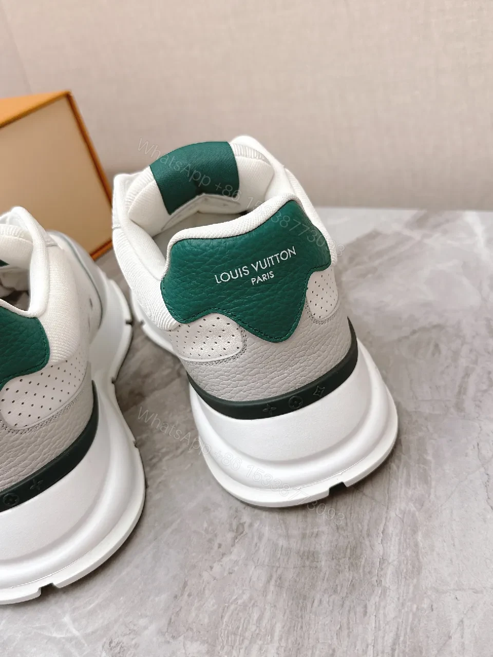 View 3 of White Leather Sneaker with Green Accents: Modern Luxury Comfort