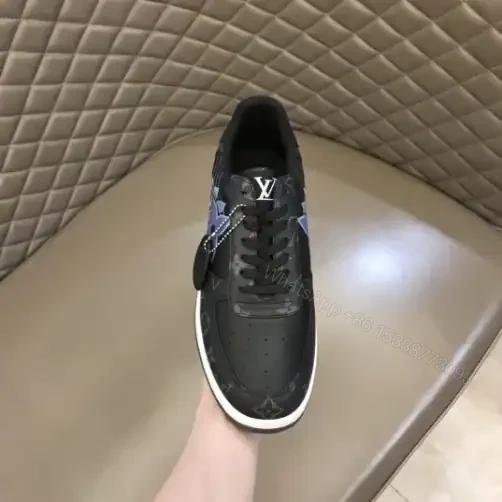 View 5 of LOUIS VUITTON RIVOLI SNAKERS IN BLACK CALF LEATHER AND MONOGRAM CANVAS – LSVT368
