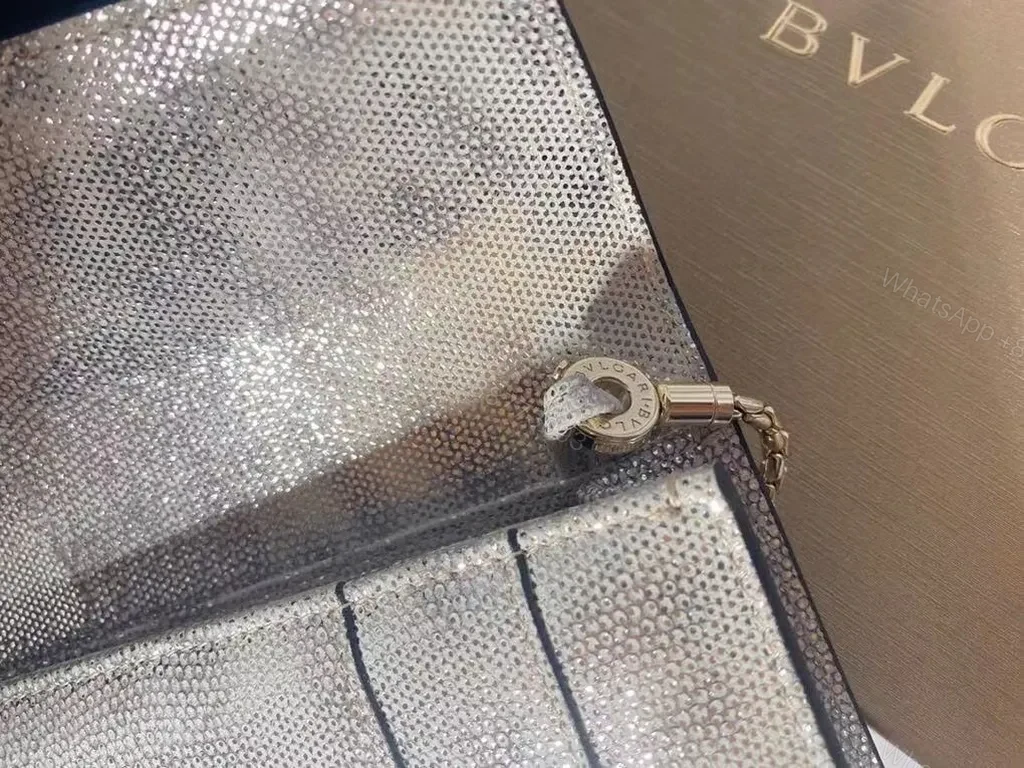 View 6 of Statement Metallic Handbag: BVLGARI x Katrantzou Bracelet Clasp Crossbody
