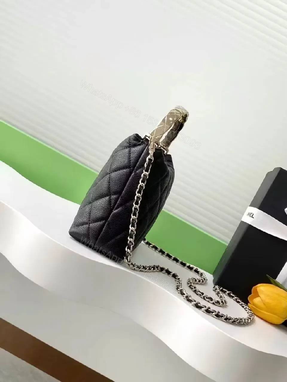 View 2 of Quilted Mini Bag with Gold Hardware—Chic, Compact Style