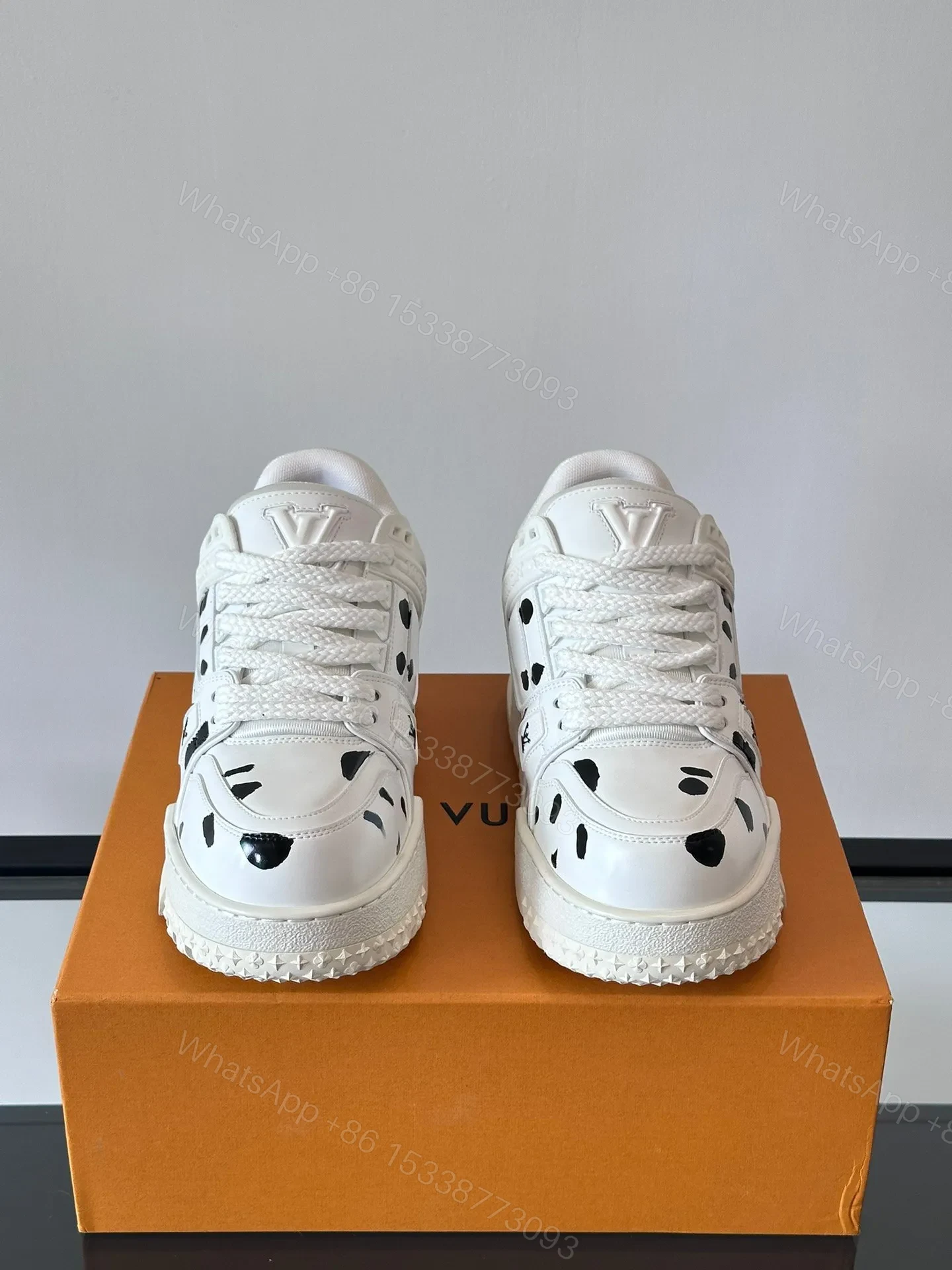 View 2 of LV Men White Leather Black Spot Sneakers