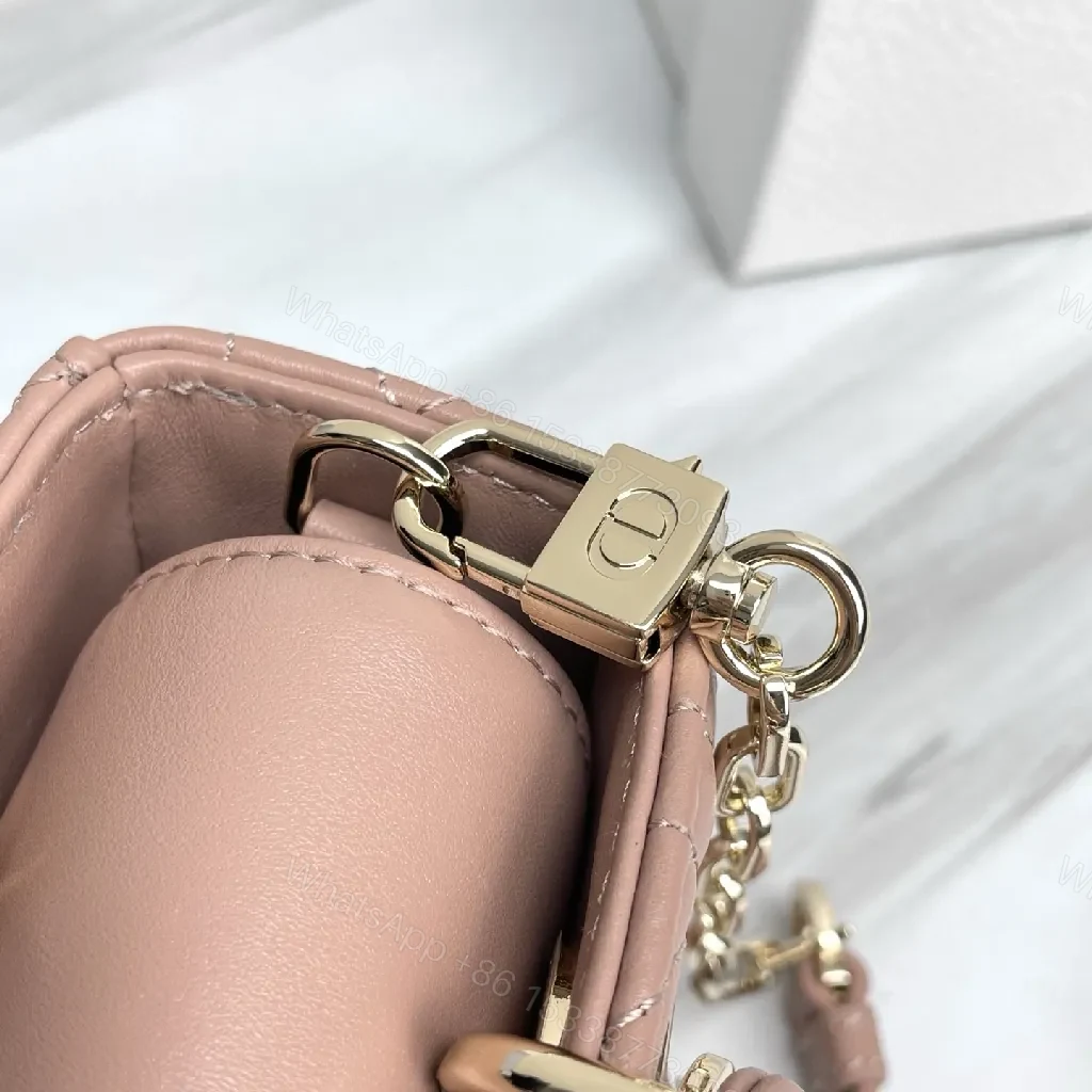 View 3 of Soft Pink Quilted Mini Crossbody with Gold Charms - Compact Luxury Bag