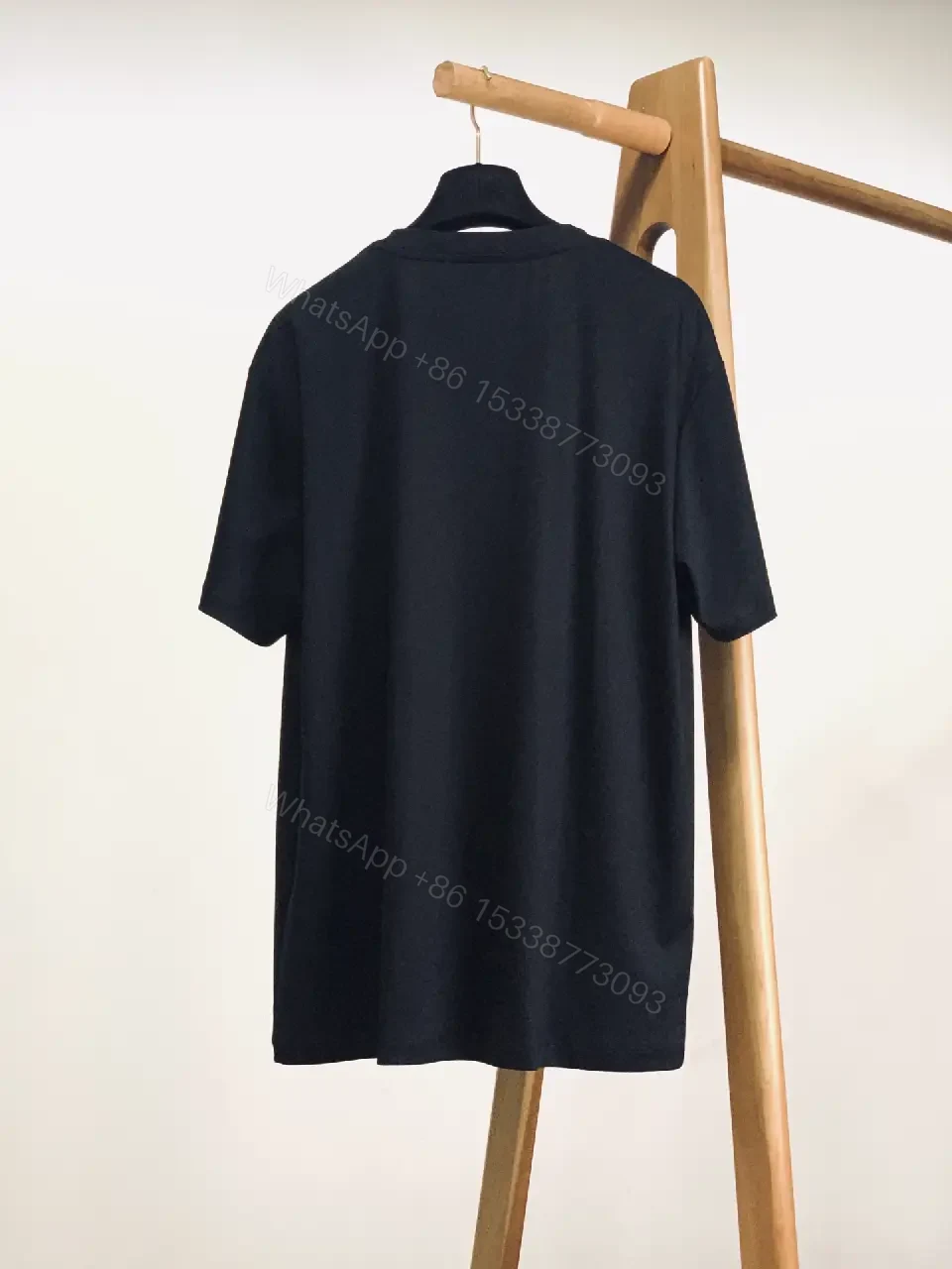 View 6 of Black Cotton Graphic Tee: Luxe-Inspired Statement Tee