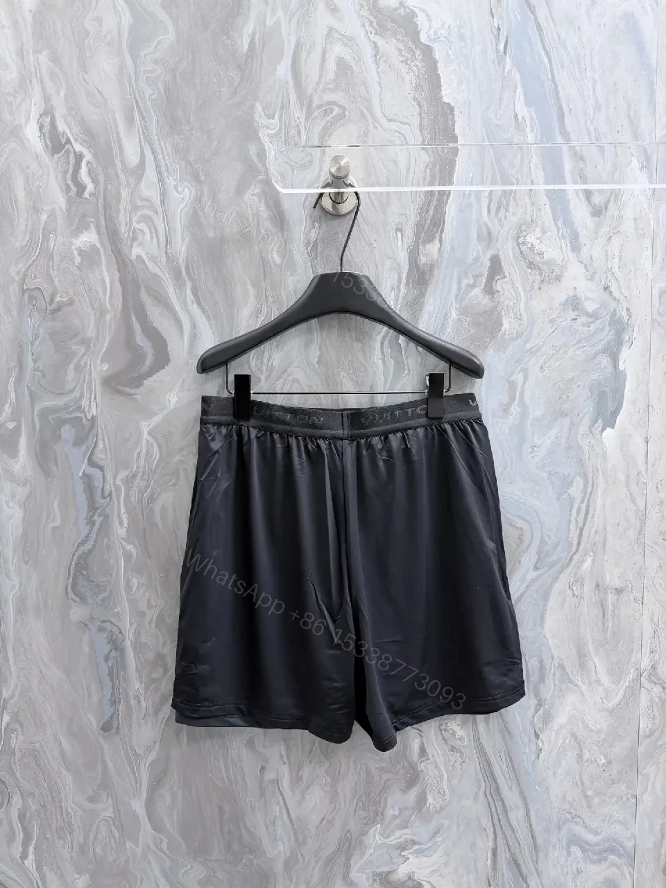 View 6 of Sporty Luxe Black Shorts with Subtle Luxury Details