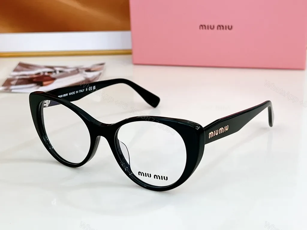 Miu Miu Black Cat-Eye Eyewear: Everyday Luxury — view 1