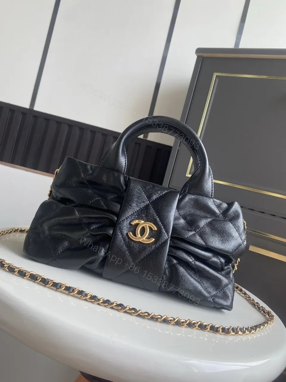 View 9 of Quilted Mini Bag: Black, Satin-like, Chic, Gold Hardware, Clutch