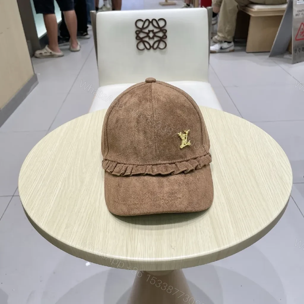 View 9 of Brown Suede Cap with Gold Emblem - Textured Luxury Cap