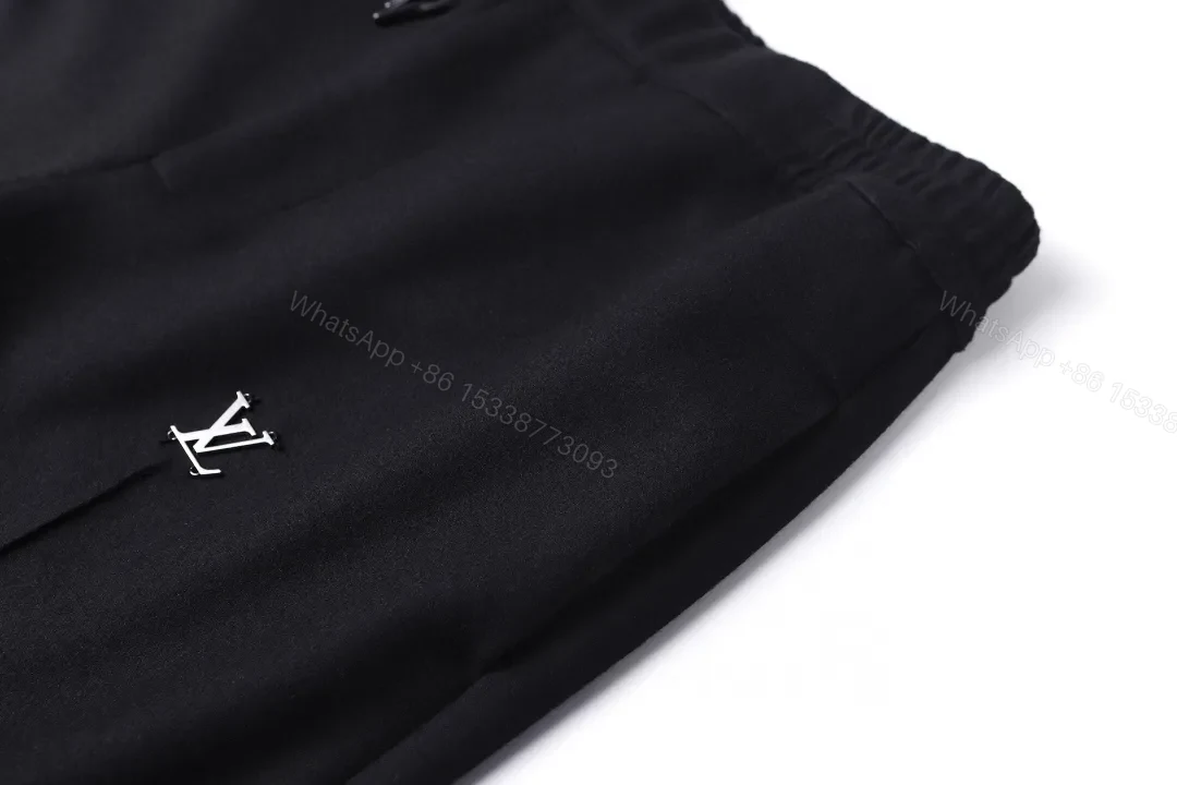 View 7 of Chic Black Wide-Leg Track Pants with Subtle Monogram Monstère