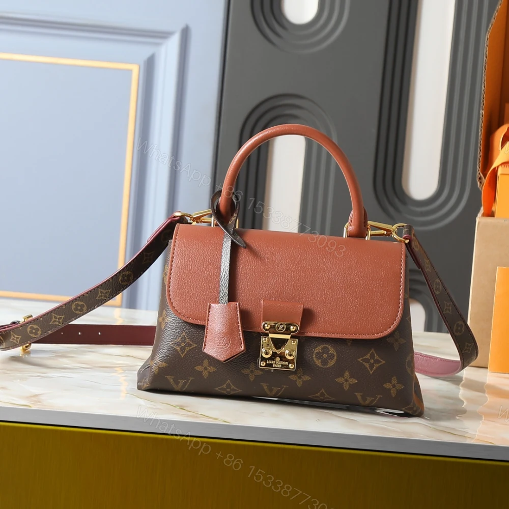 View 2 of Louis Vuitton Madeleine BB Monogram Cognac 24Cm M28288
