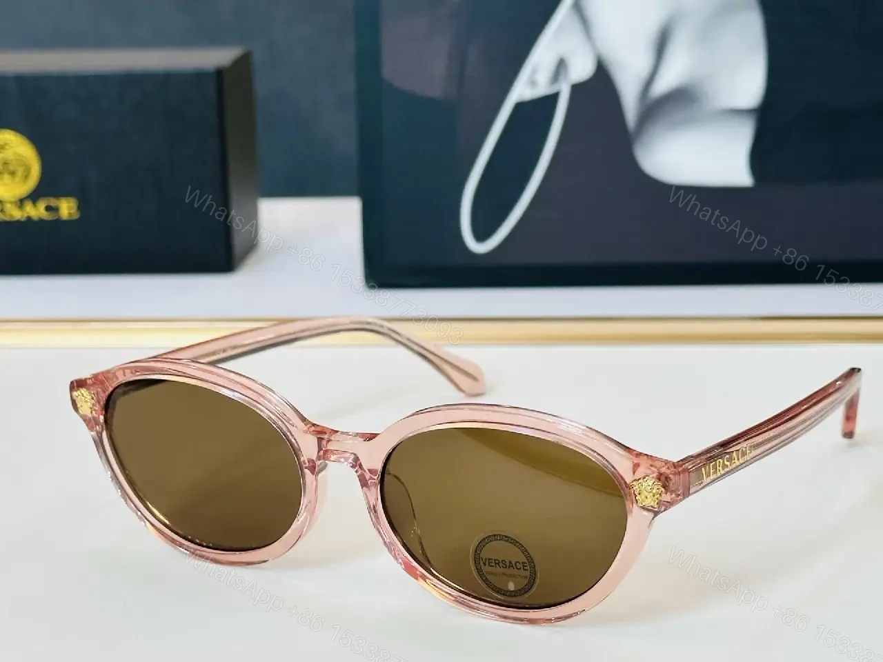 View 4 of Glassy Black Round Sunglasses with Gold Accents, UV400 Protection