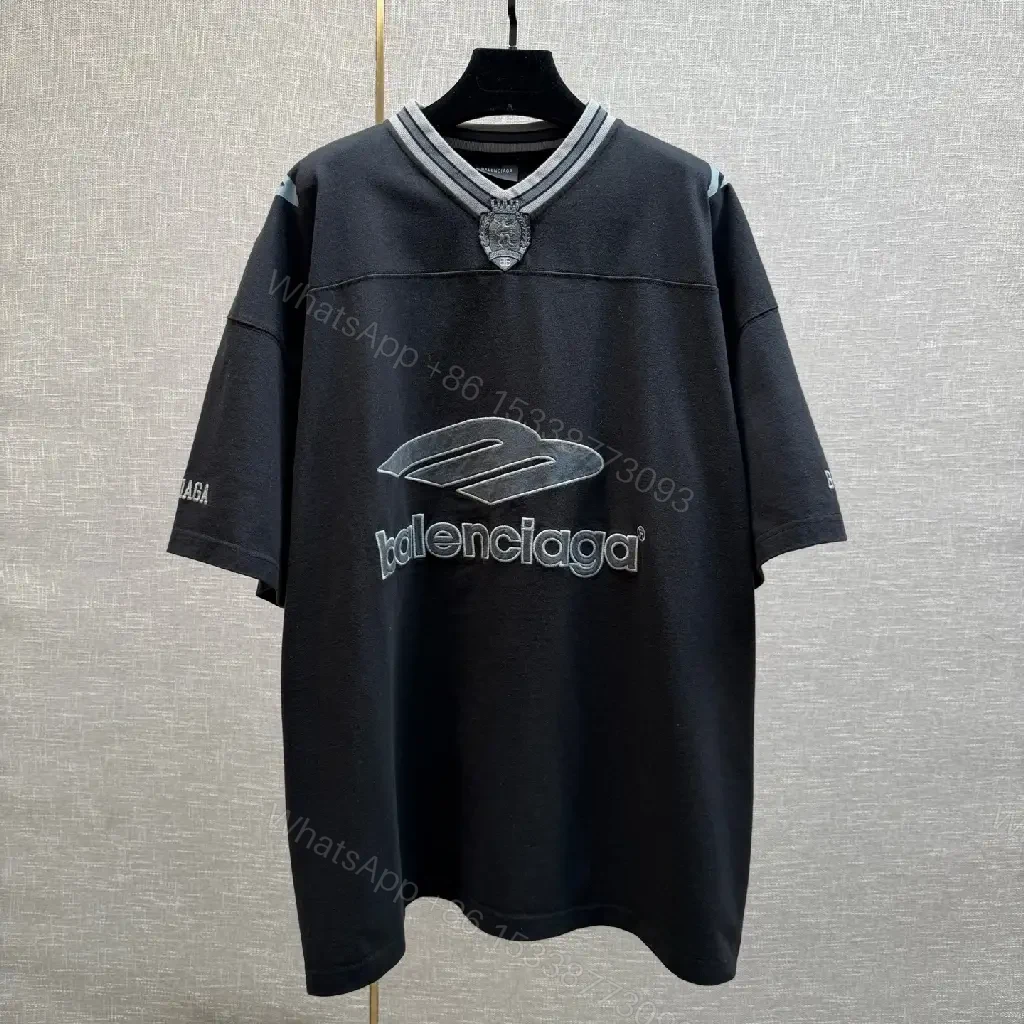 Bold Logo Knit: Oversized Streetwear with Hardware Details — view 1