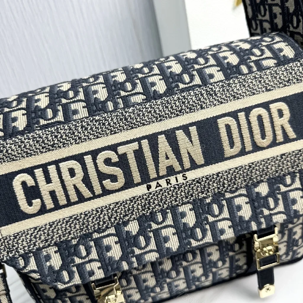 View 7 of Compact Monogram Crossbody: Luxe, Structured, Everyday News