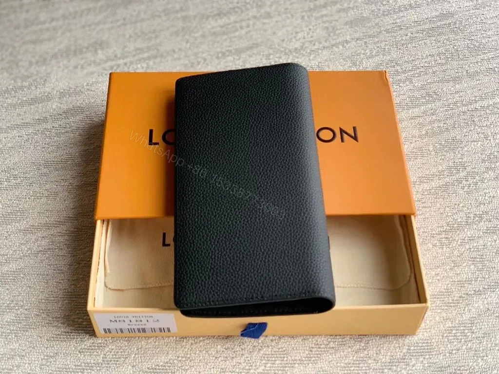 View 3 of Pristine Black Leather Wallet â€” Subtle LV Emblem, Organized