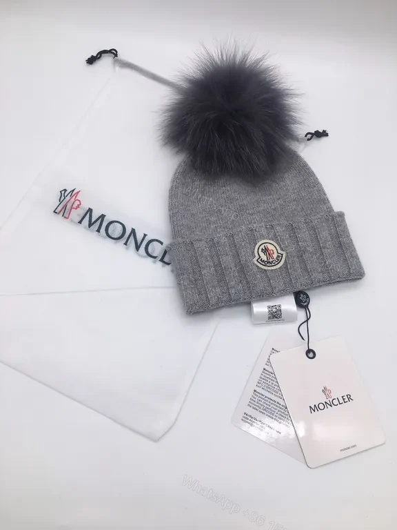 View 3 of Sunny Yellow Moncler Pom Beanie â€“ Luxurious Warmth, Bold Color Pop