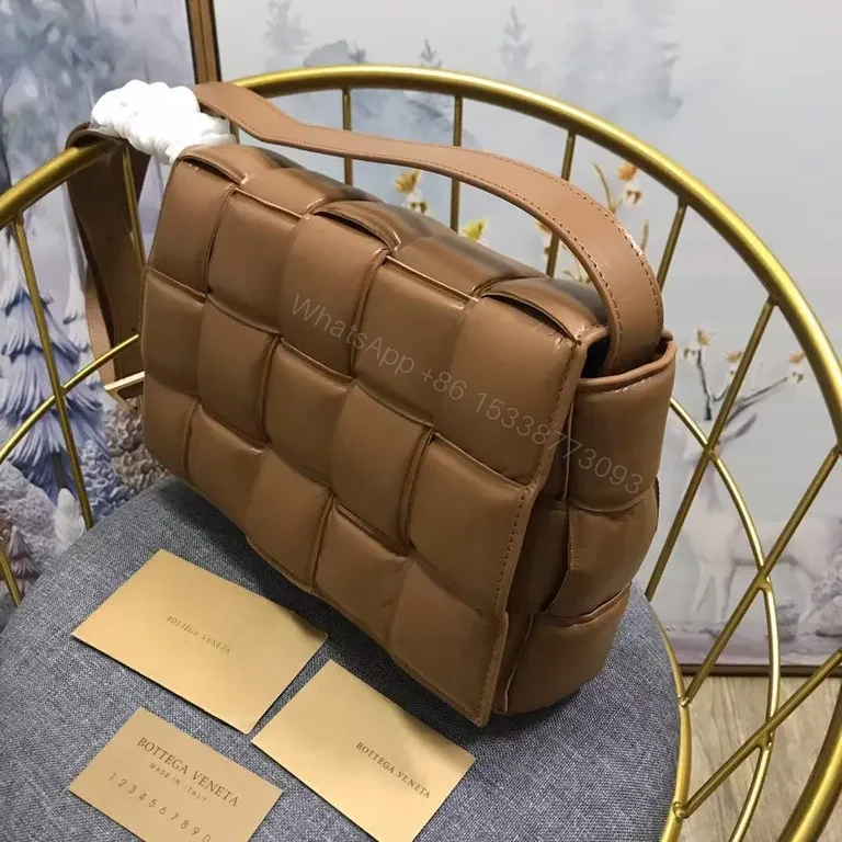 View 2 of Suede-Gloss Quilted Barrel Bag: Modern Texture Luxury