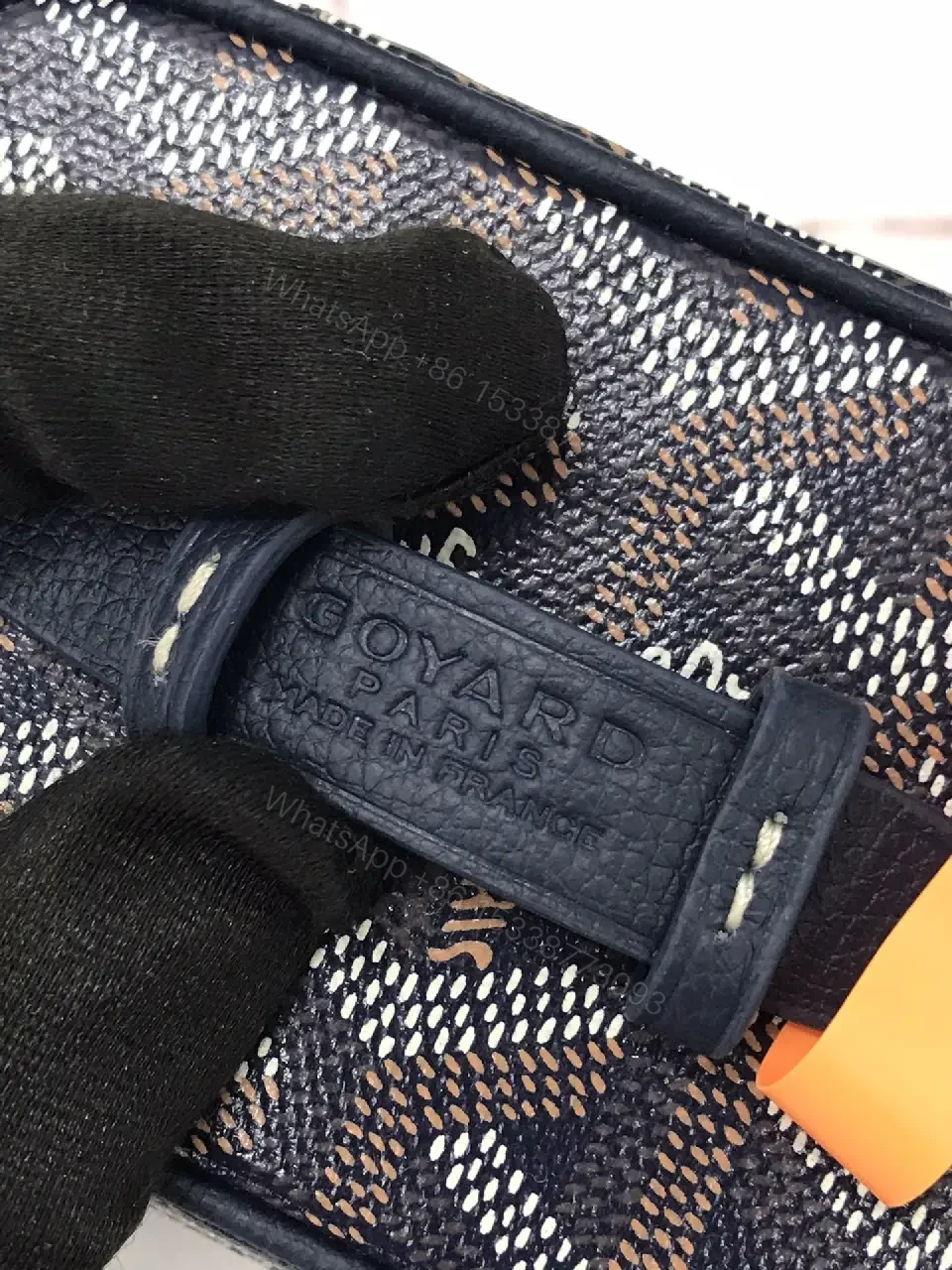 View 4 of Colorful coated-canvas pouch with distinctive pattern, compact design, durable, luxury vibe