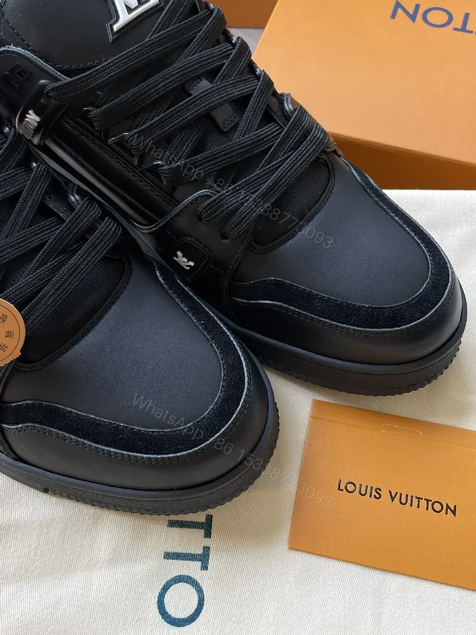 View 5 of Black Leather High‐Top Sneakers with LV Embellishments
