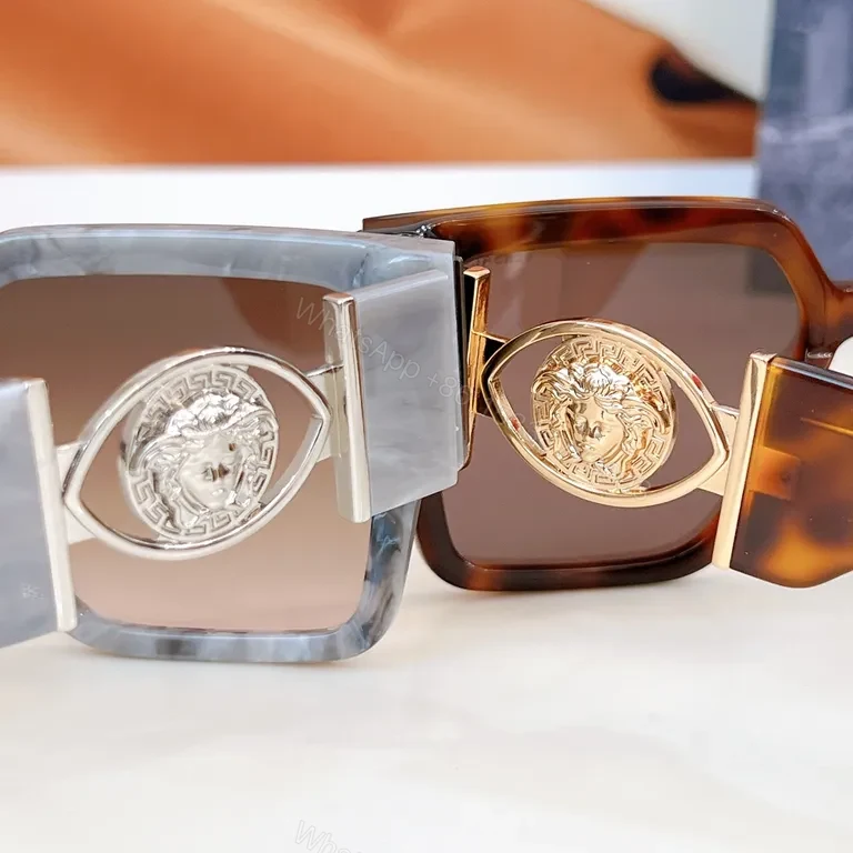 View 3 of Bold Oversized Sunglasses with Gold Accents: Statement Layer