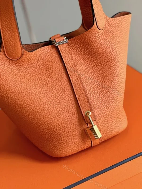 View 2 of HN 18 Orange Togo Leather Gold Hardware