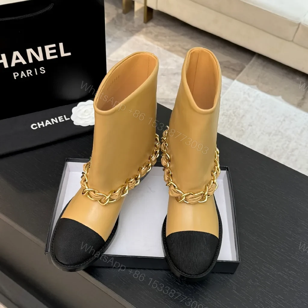 View 3 of Chic Tan Leather Boots with Black Toe Cap and Chain Detail