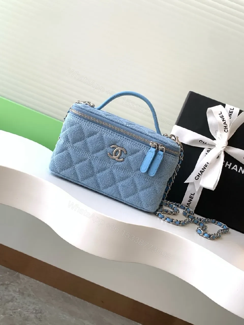 Denim Mini Bag: Quilted Charm, Silver Hardware, Chain Strap — view 1