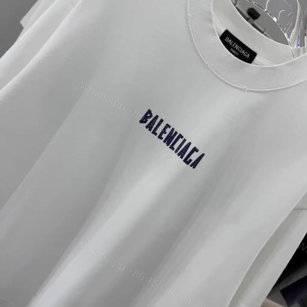 View 3 of White Cotton Minimalist Tee with Centered Logo