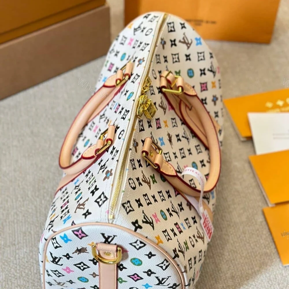 View 2 of Louis Vuitton Keepall Bandoulière Vanilla 40Cm M25233