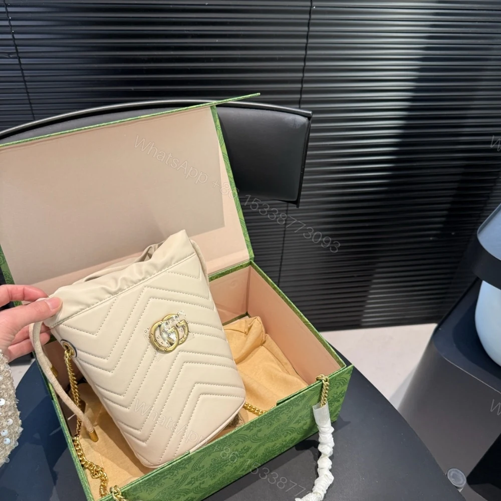 View 2 of Gucci GG Marmont Matelassé Chevron Mini Bucket Bag White 12Cm 575163 DTDRT 9022