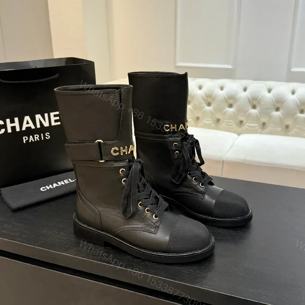 View 5 of Chic Black Combat Boots with Gold Detailing - High-Top Style