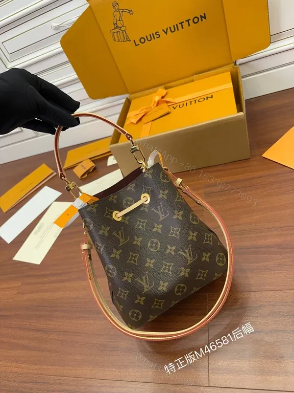 View 3 of Elegant Monogram Barrel Bag â€” LV Canvas, Leather Trim, Adjustable Strap, Day-to-Night Luxury