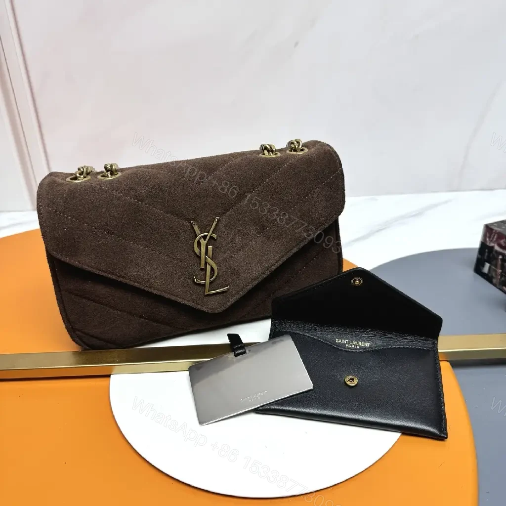 View 6 of Compact Suede Shoulder Bag with Gold Emblem - Textured Chic Everyday Luxury