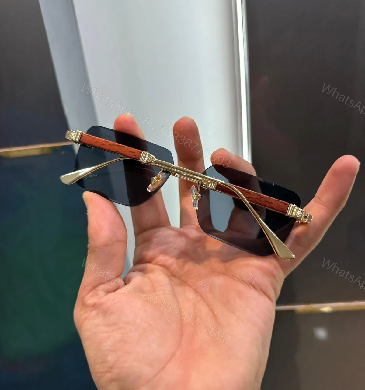 View 3 of Cartier Rimless Sunglasses Gold-Black