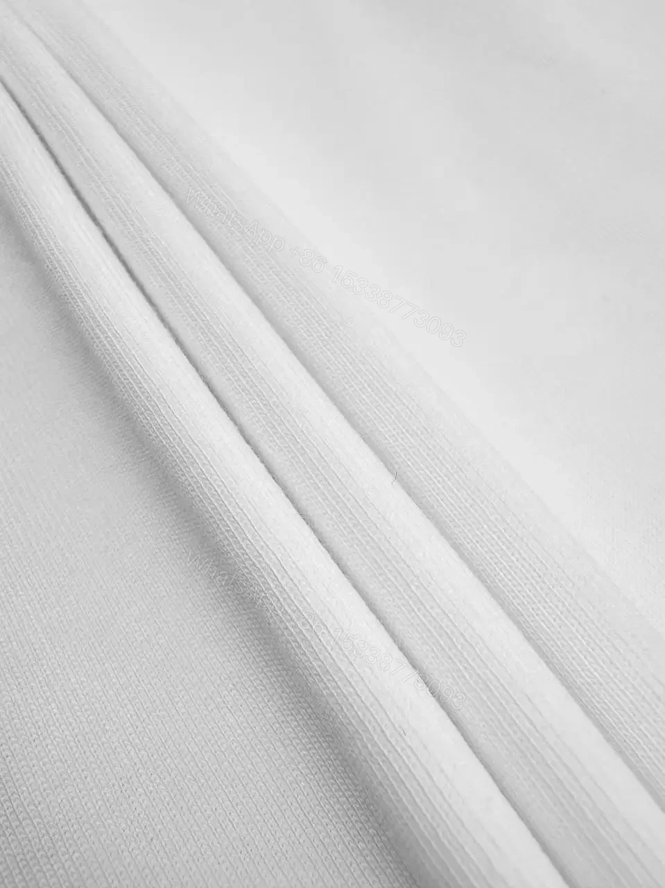 View 4 of White Cotton Minimalist Logo Tee with Signature Graphic
