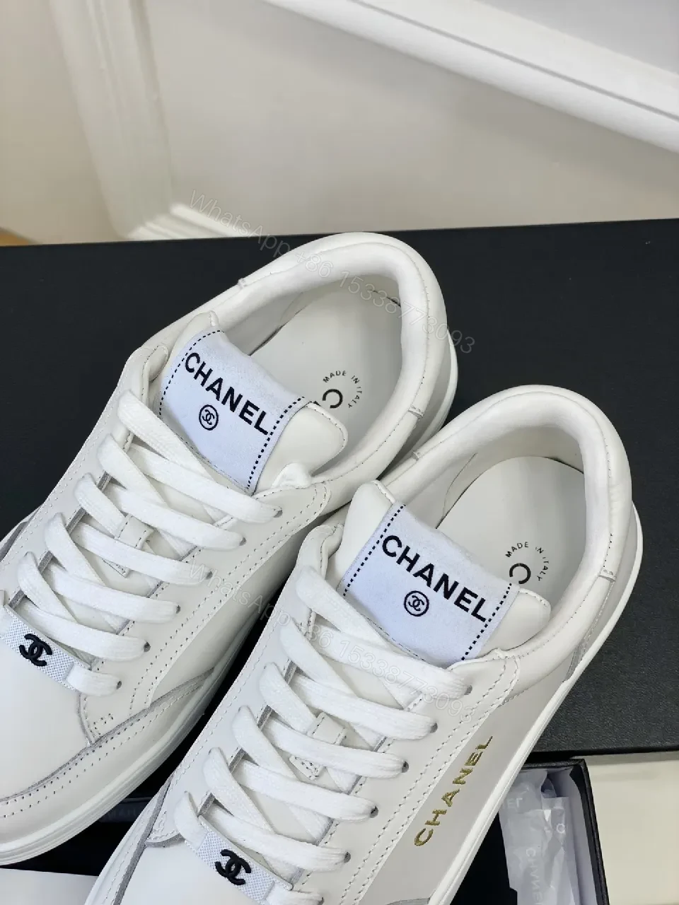 View 4 of White Leather Sneakers: Minimalist High-Tops with Gold Logo