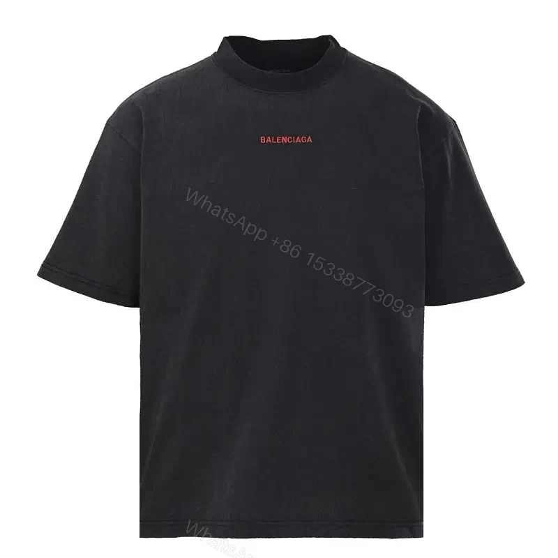 Minimalist Black Cotton Tee with Subtle Red Embroidery — view 1