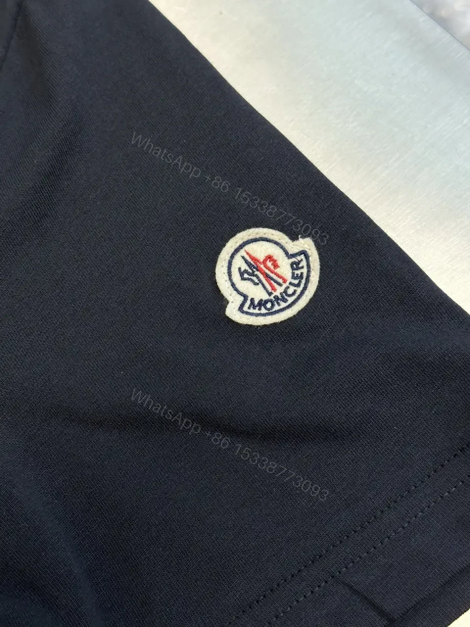 View 7 of Relaxed Luxury Patch Tee - Cotton Blend, Subtle Branding, Casual/Smart-casual