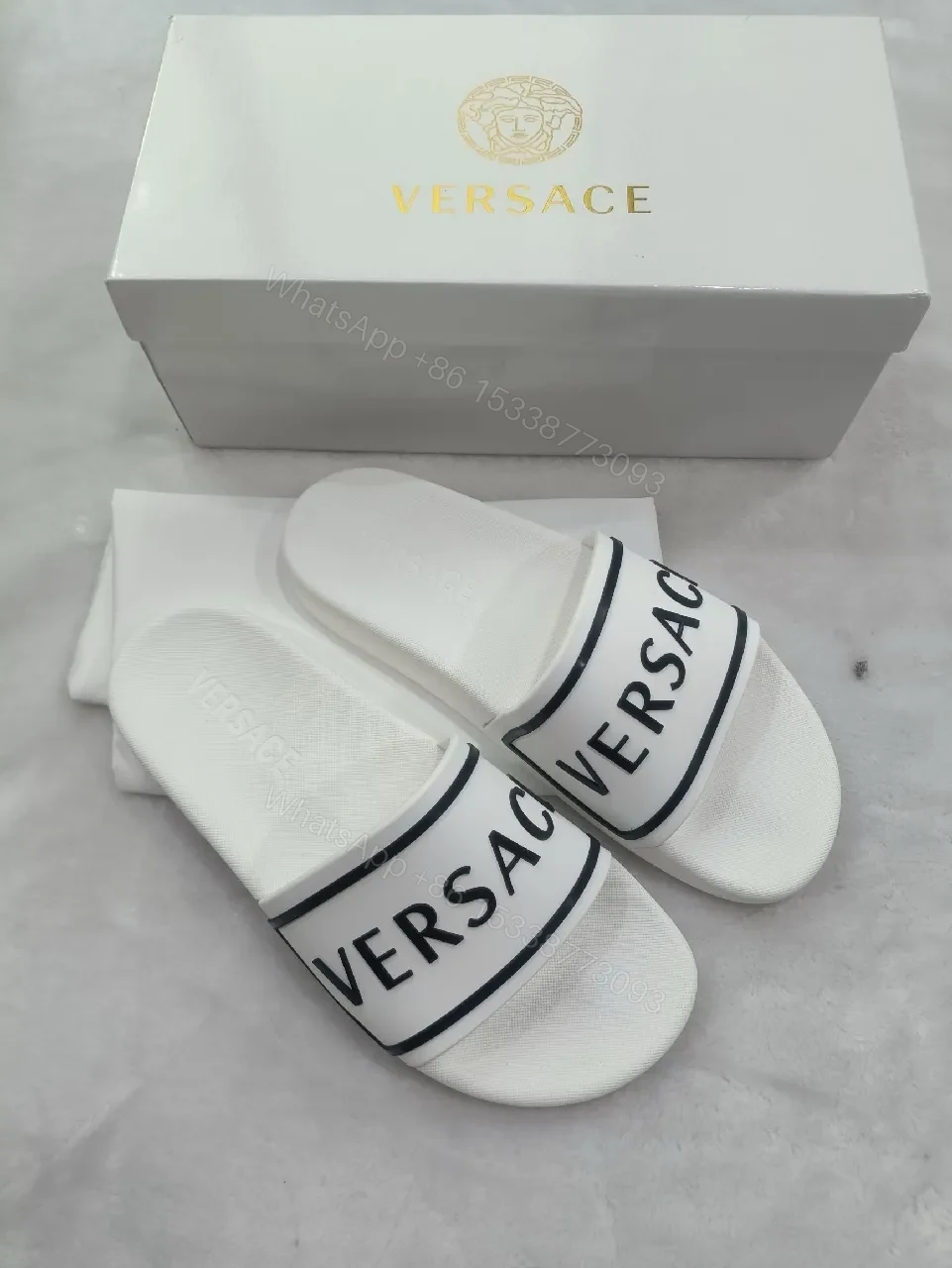View 5 of White Leather Slide with Bold Brand Stripe, Unisex Comfort