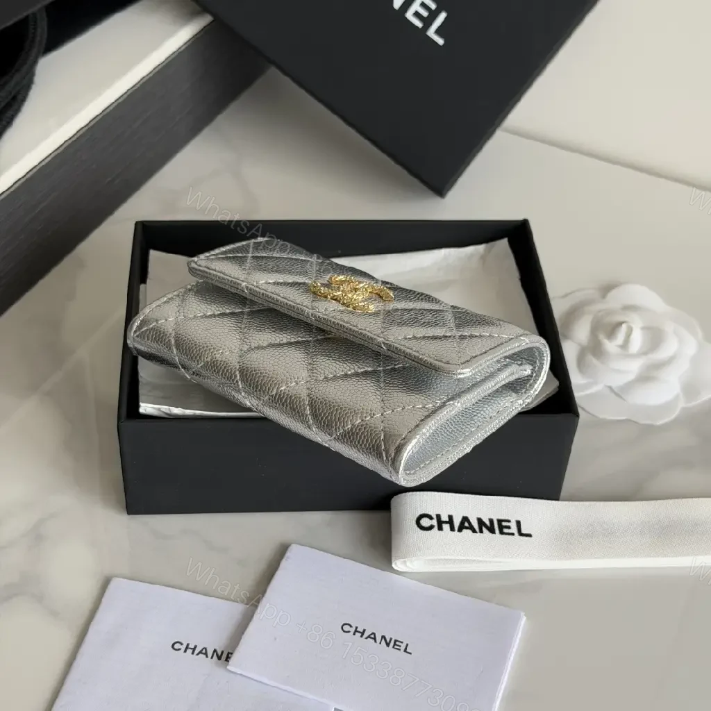 View 5 of Metallic Silver Leather Quilted Flap Wallet, Compact Bi-fold with Gold CC Logo