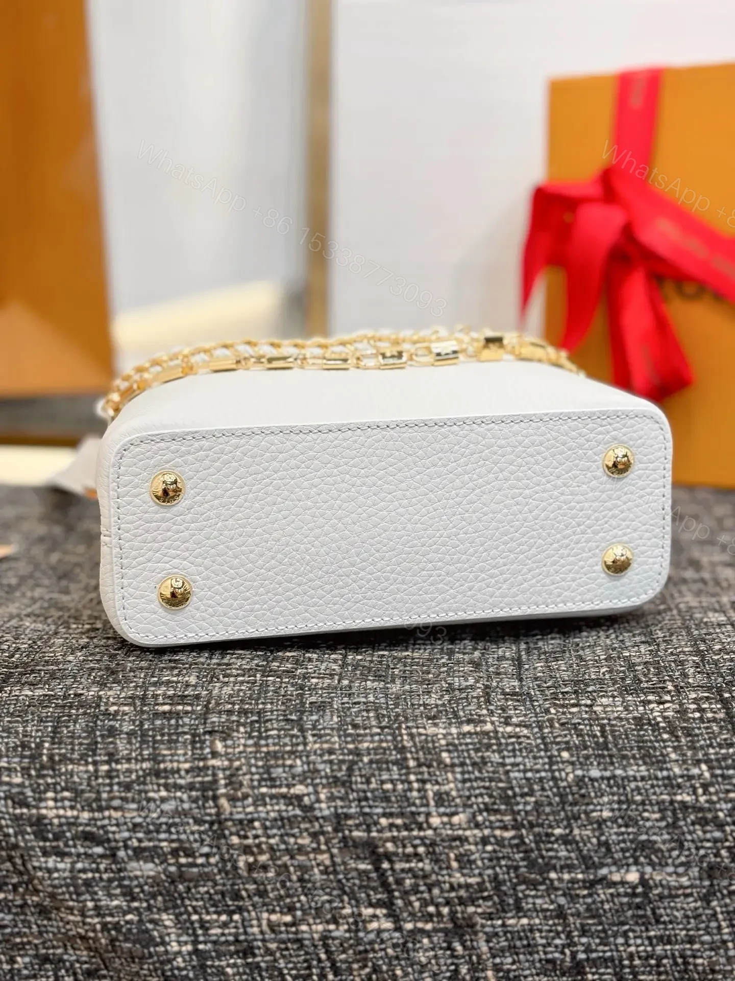 View 3 of Louis Vuitton Capucines bag in white Taurillon leather