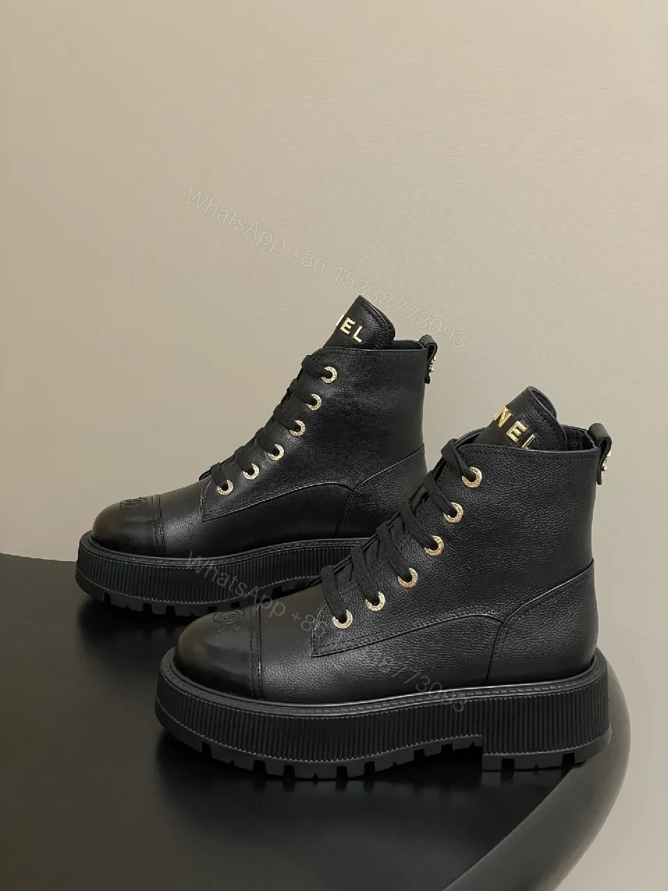 View 3 of Black Leather Combat Boots with Gold Branding Feature