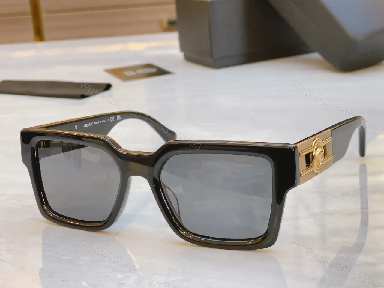 View 9 of Deep Tone Frame Luxe Sunglasses with Signature Hardware