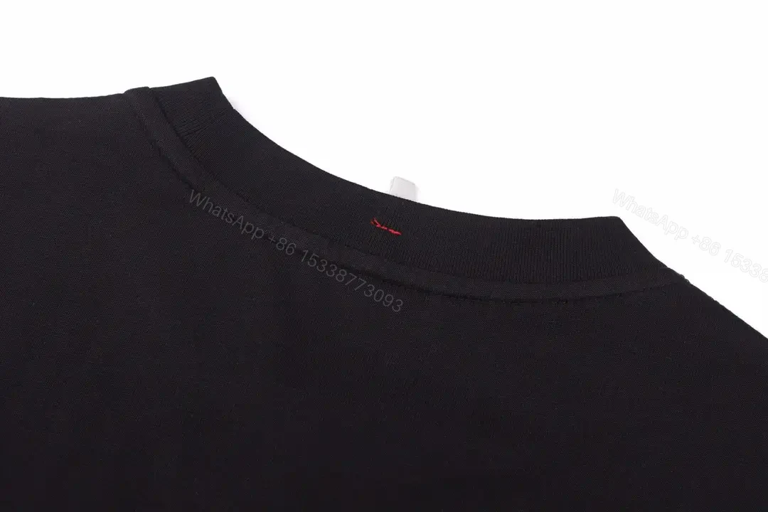 View 7 of Black Cotton Relaxed Fit Tee with Chest Text Graphic and Emblem - T-Shirt