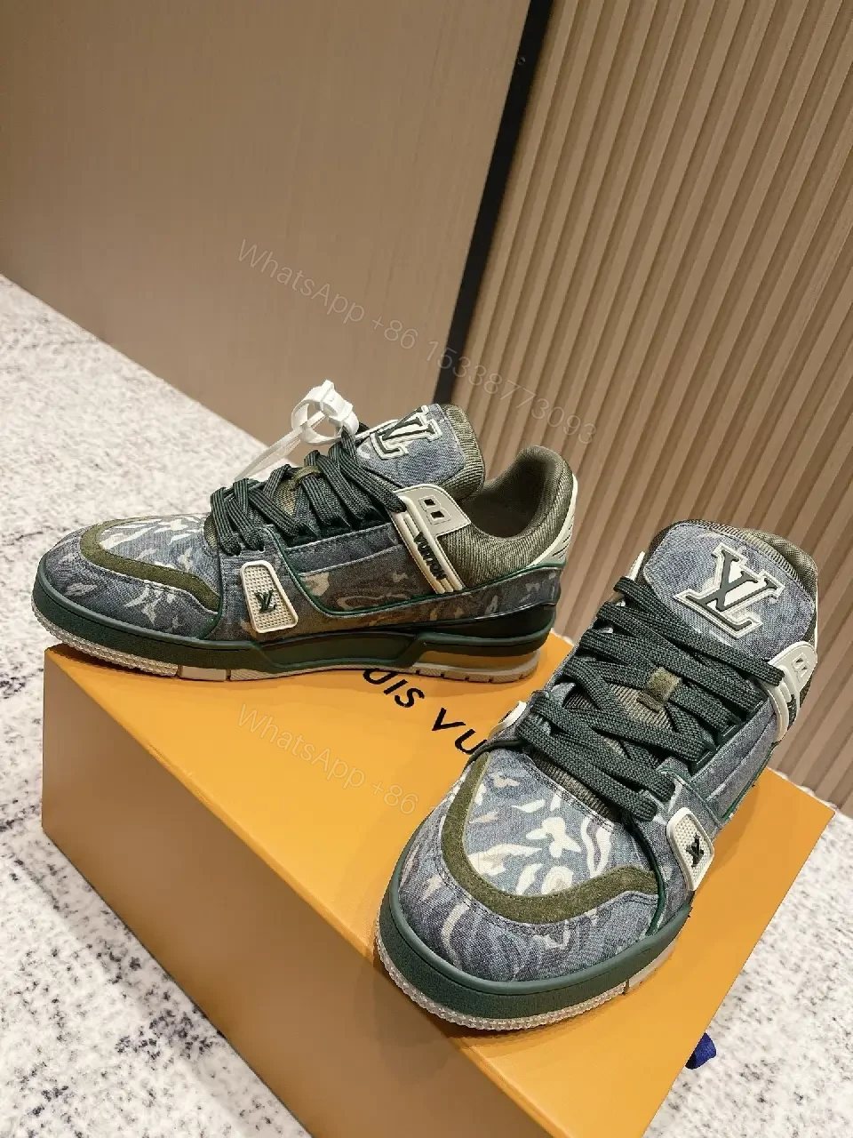 View 6 of Denim Textured Sneaker with LV Detailing, Modern Couture Outdoors